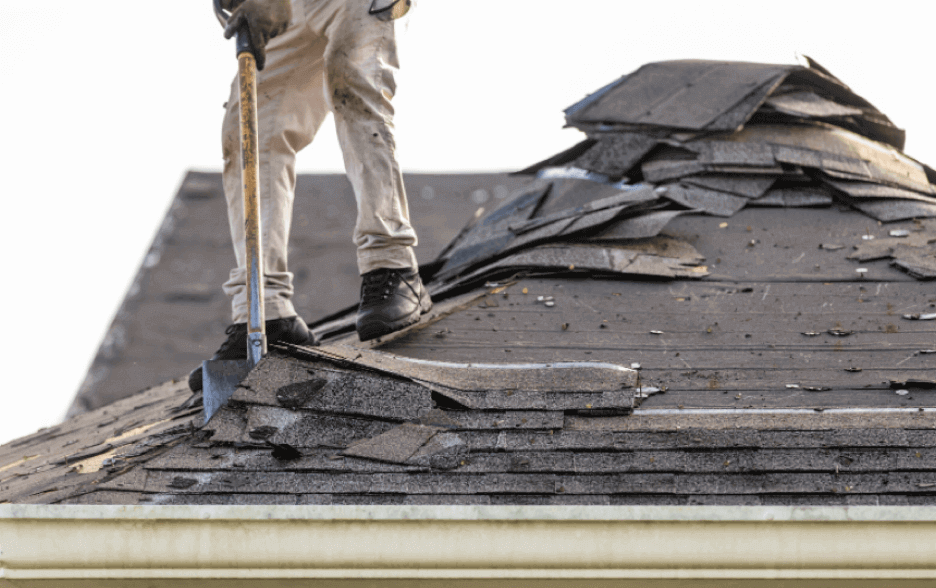 Removing old shingles on a roof